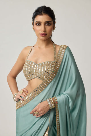 Powder blue satin sari and halter blouse
