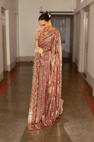 Berry red printed and embroidered sari and blouse