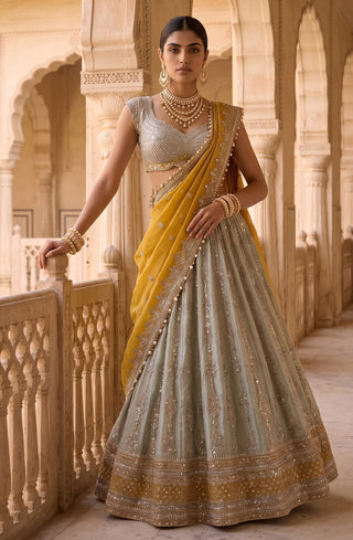 Basanti gulzar green silk tissue lehenga set