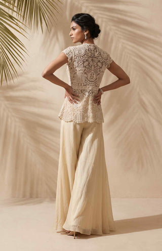 Amalie ivory peplum and palazzo set