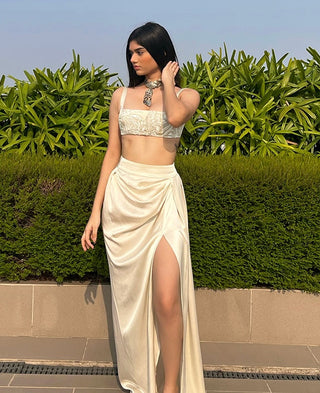 White crop top and draped skirt