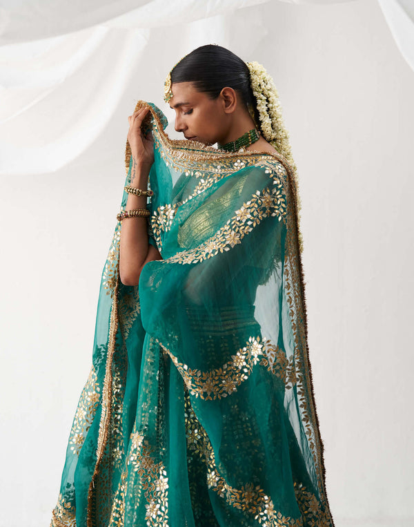 Chandramallika green lehenga set