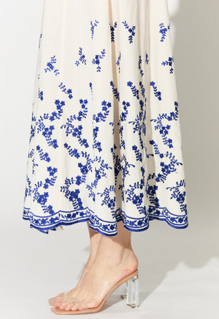 White with blue embroidered sleeveless long dress