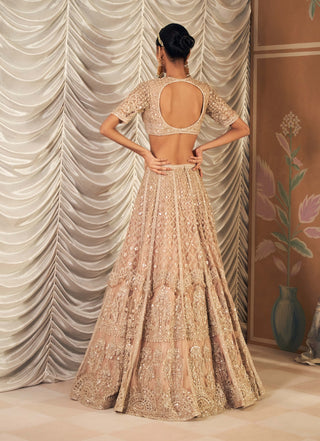 Champagne Sukhan Lehenga Set by Ridhi Mehra, available on Indiaspopup.com