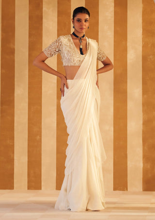 Ivory Naqaa Drape Sari And Blouse by Ridhi Mehra, available on Indiaspopup.com