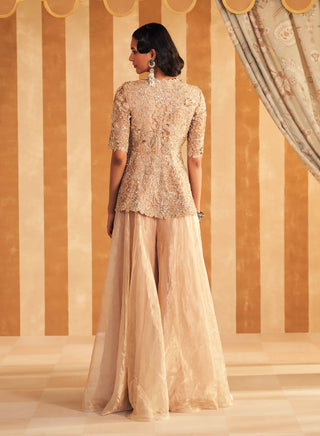 Champagne Mahroo Peplum And Sharara by Ridhi Mehra, available on Indiaspopup.com