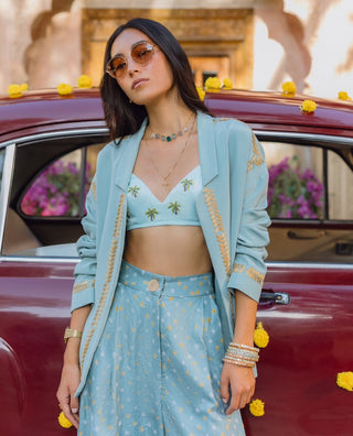 Blue bralette, bandhani trousers and jacket