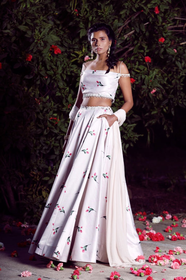 Beautiful off-shoulder blouse with floral printed grey lehenga. See more on  wedmegood.com #wedmegood #india… | Indian bridal wear, Dress indian style,  Grey lehenga