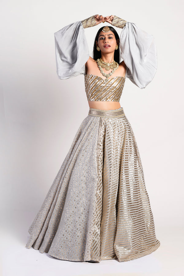 Silver tissue skirt paired with hand embroidered blouse & heavy jhal  dupatta – Arpita Mehta Official